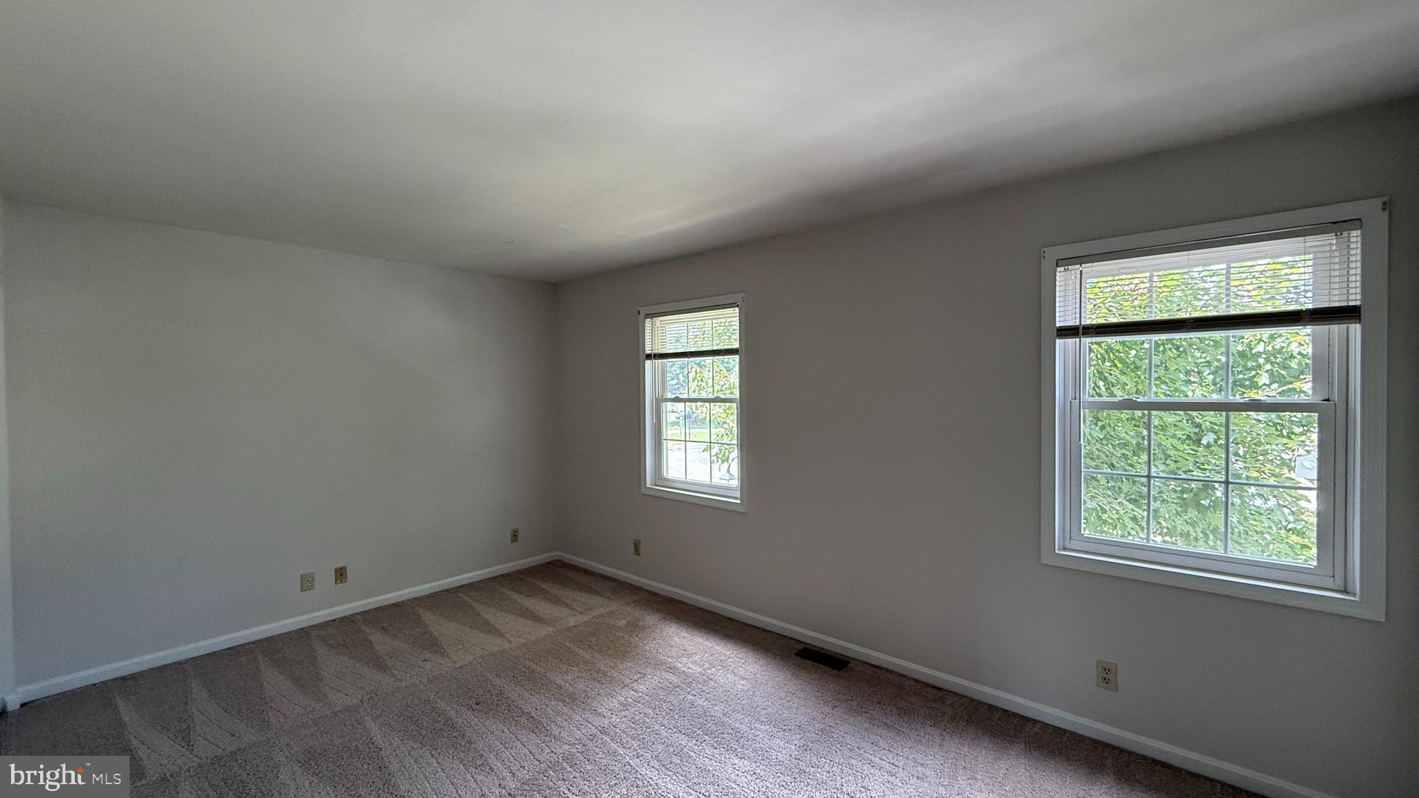 200 Surry Lane, Unit 118 Stafford, VA 22556 - Photo 10 of 13 an empty room with a window