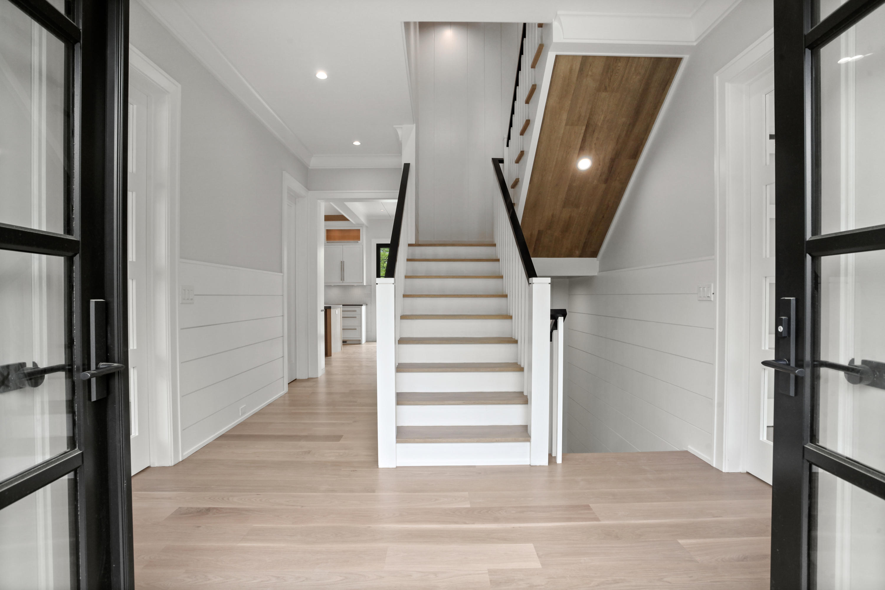 12 Dialstone Lane Riverside, CT 06878 - Photo 11 of 66 a view of entryway with wooden floor and stair