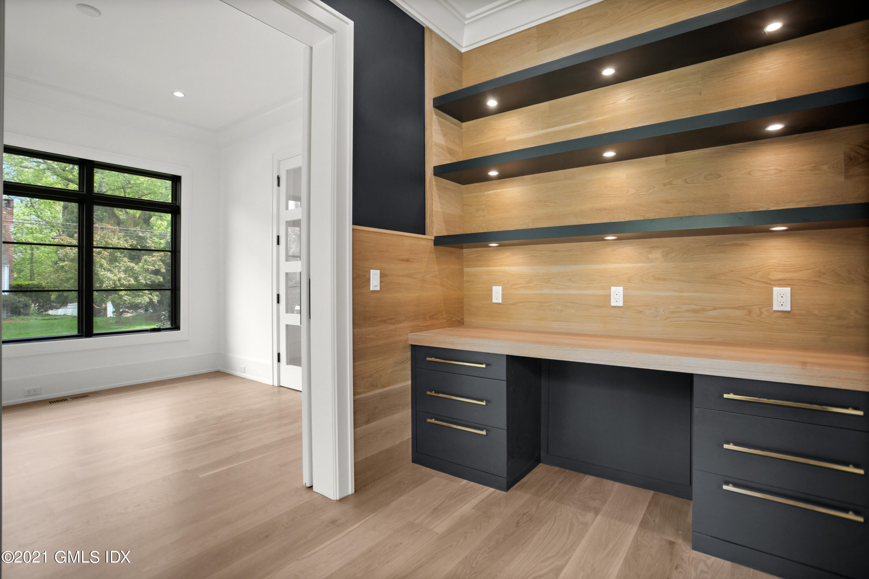 12 Dialstone Lane Riverside, CT 06878 - Photo 15 of 66 a view of room with a flat screen tv