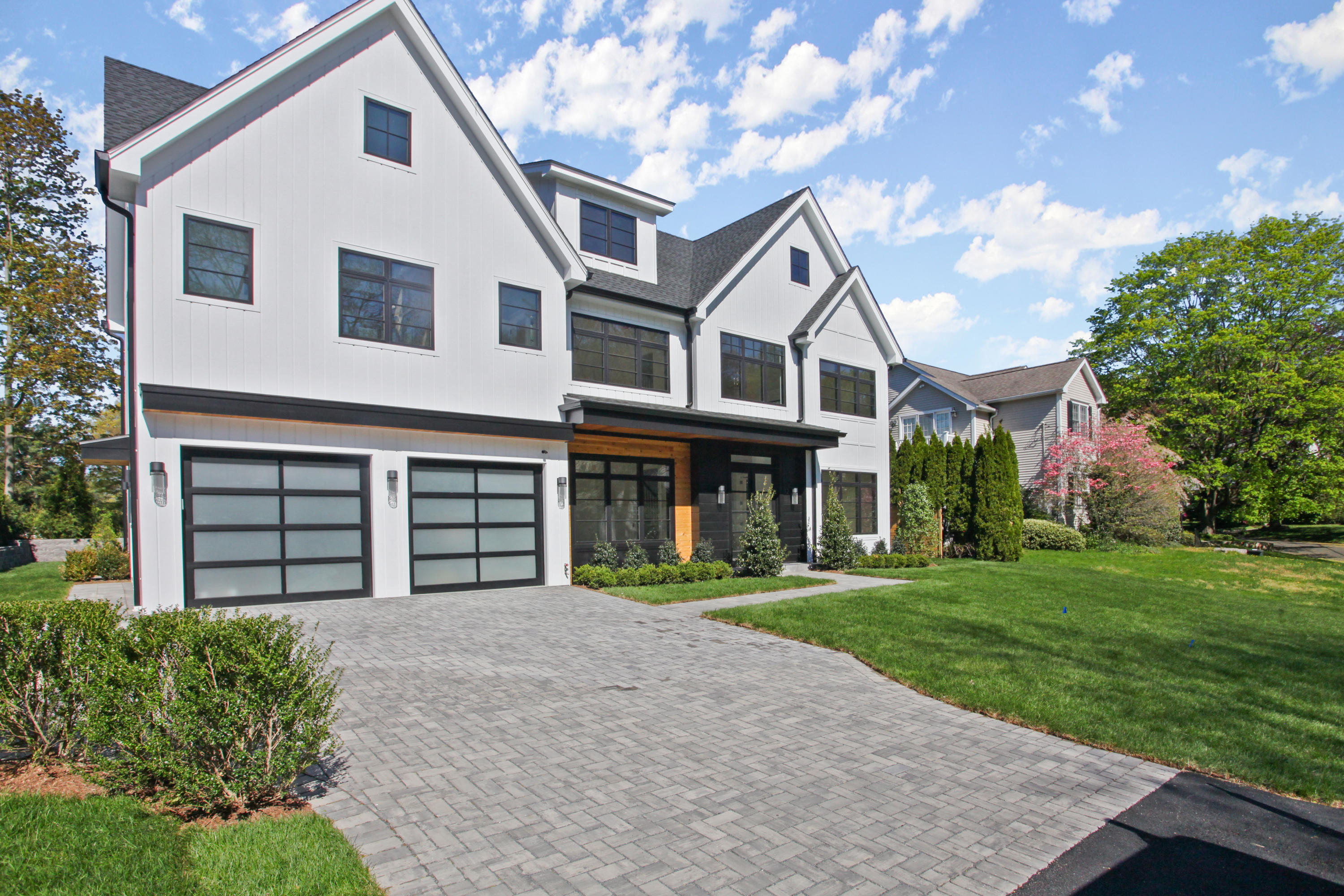 12 Dialstone Lane Riverside, CT 06878 - Photo 2 of 66 a front view of a house with a yard