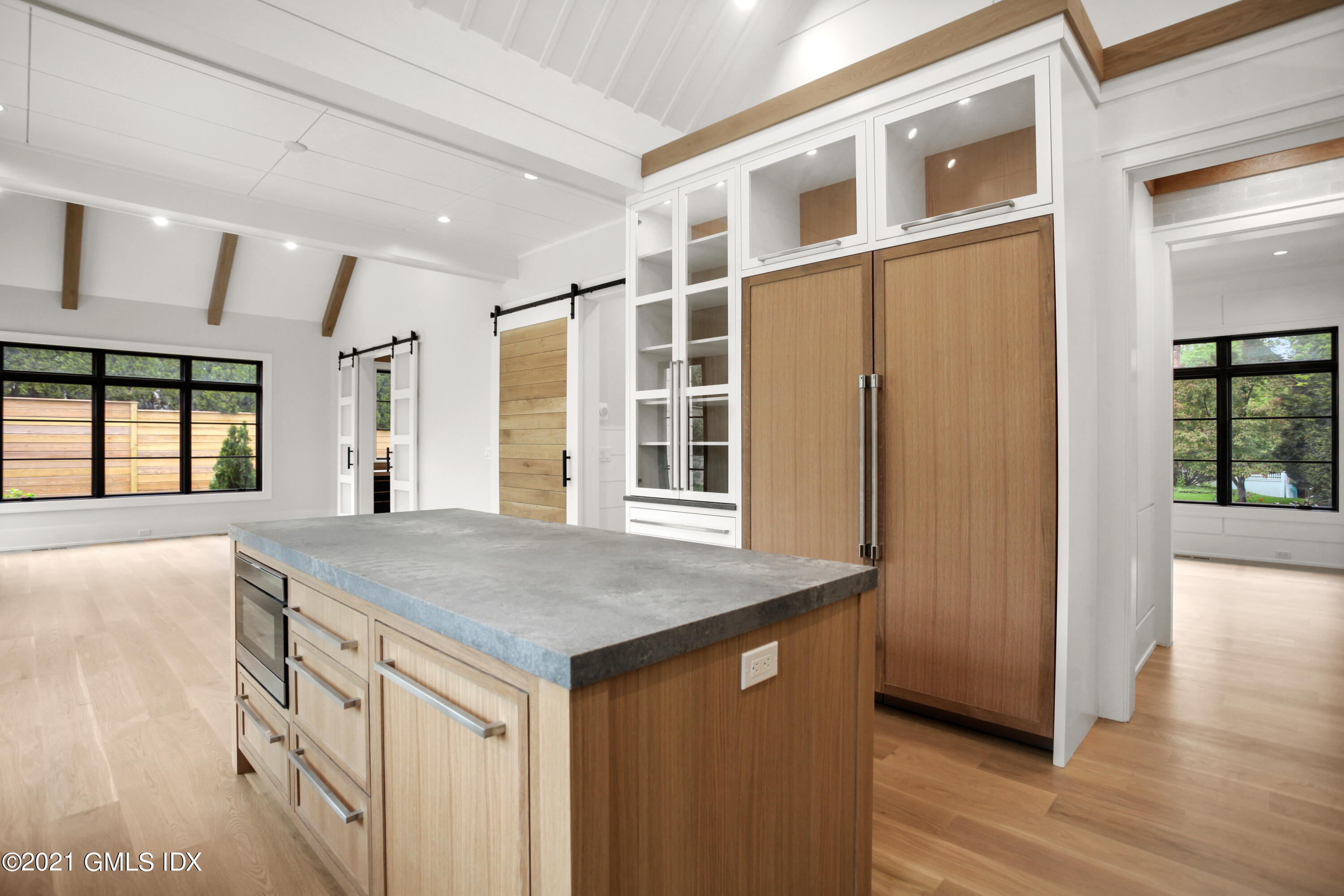 12 Dialstone Lane Riverside, CT 06878 - Photo 26 of 66 a view of a kitchen counter top space and wooden floor