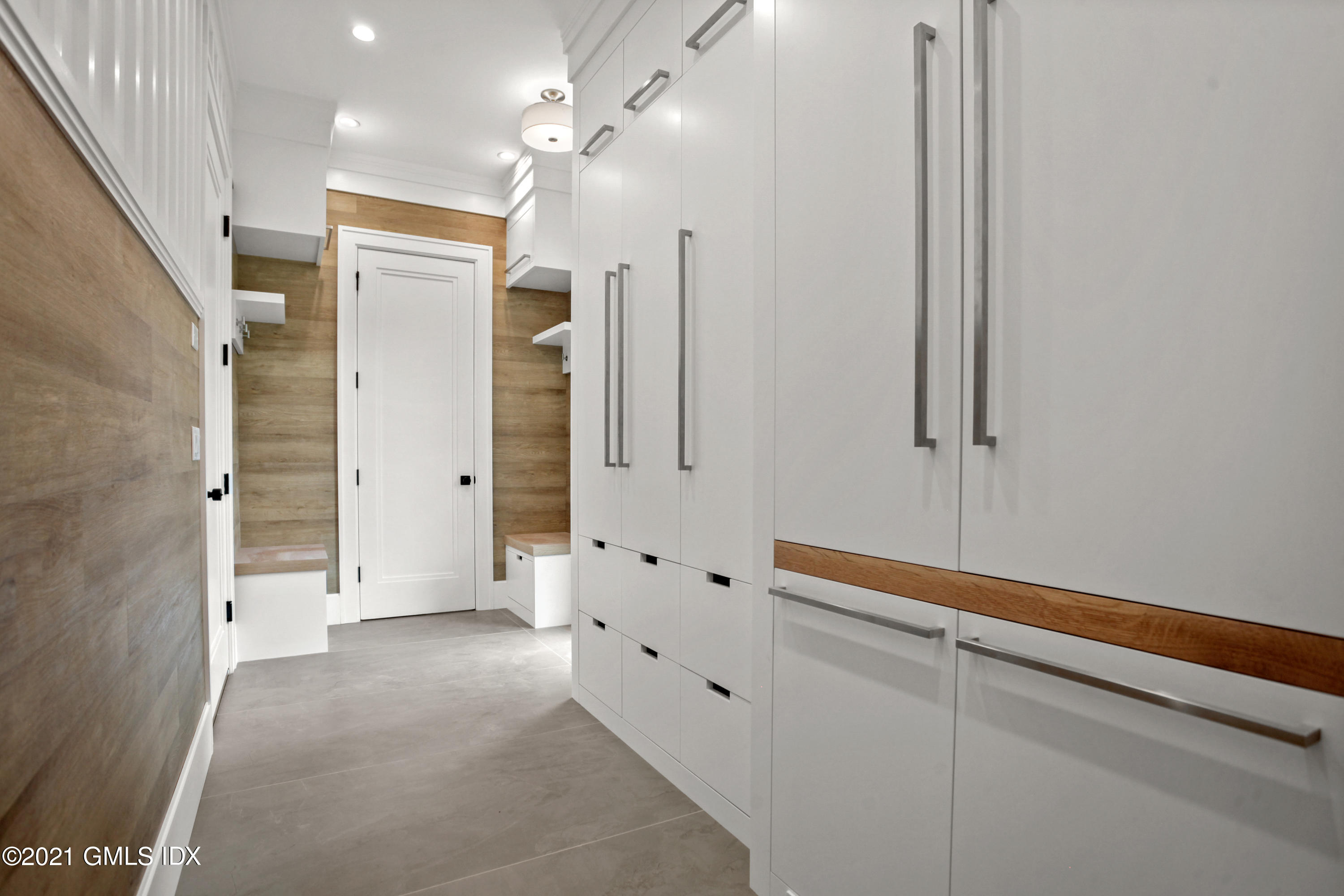 12 Dialstone Lane Riverside, CT 06878 - Photo 32 of 66 a bathroom with a shower and a glass door