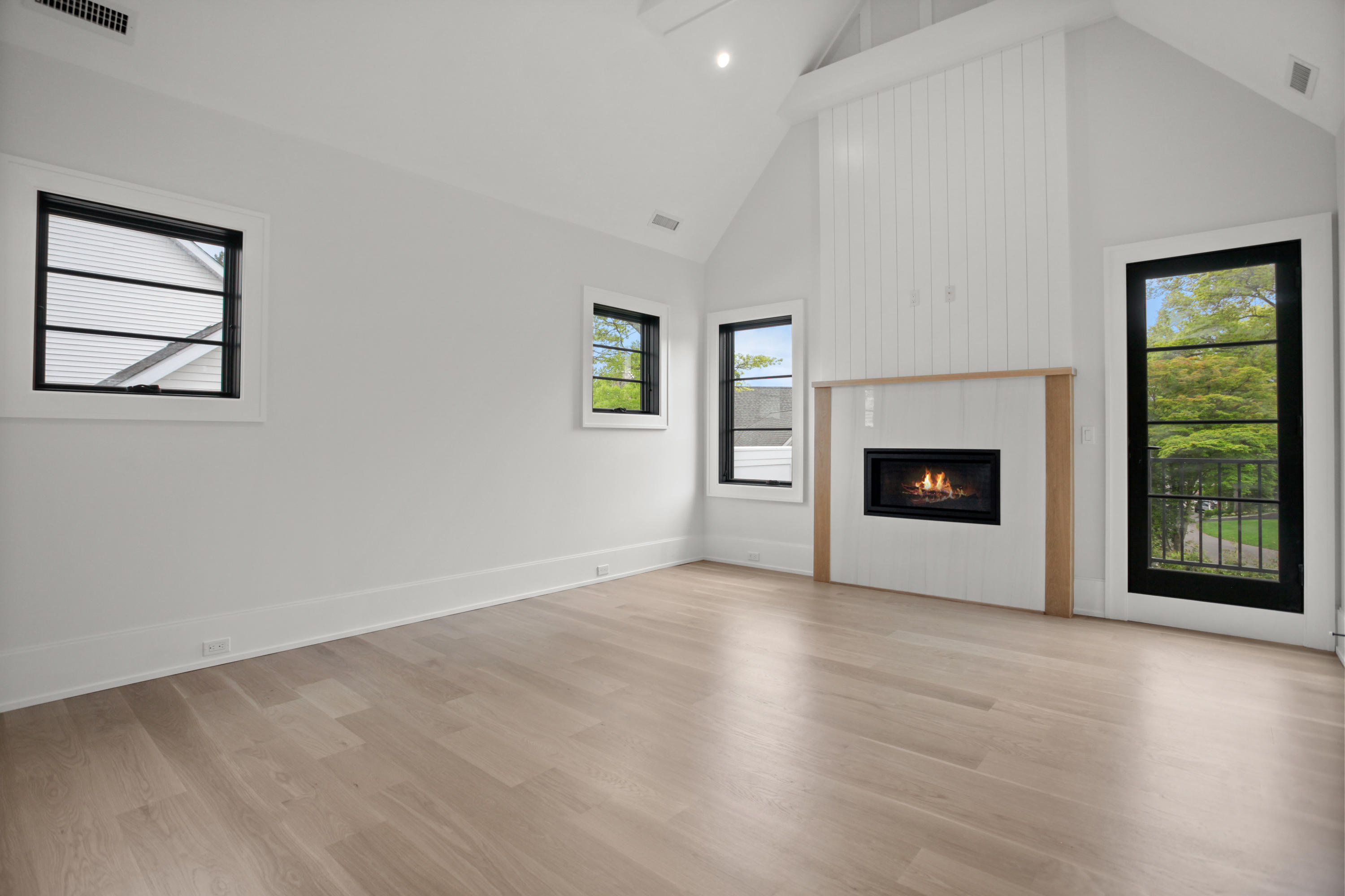 12 Dialstone Lane Riverside, CT 06878 - Photo 35 of 66 an empty room with windows a fireplace