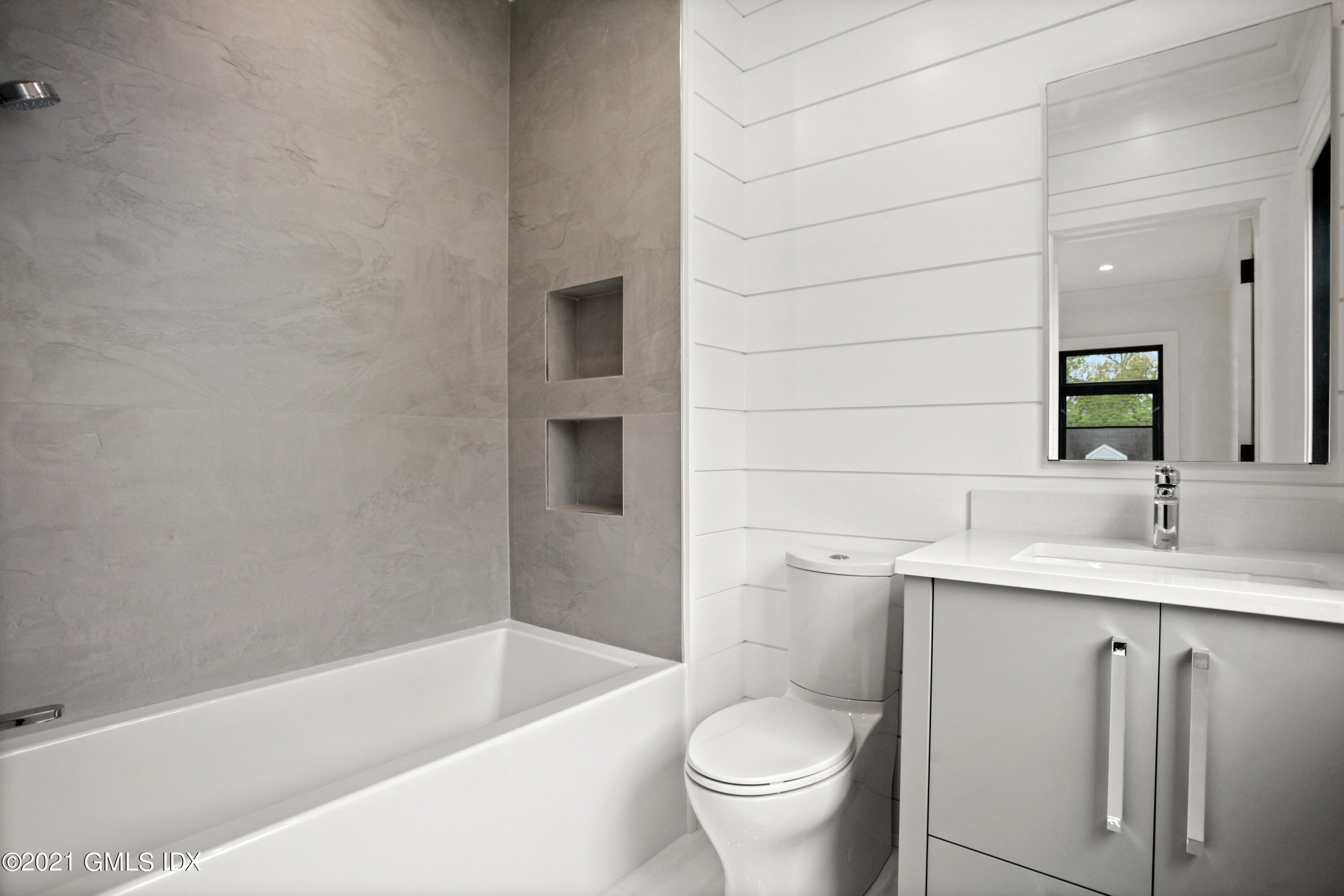 12 Dialstone Lane Riverside, CT 06878 - Photo 42 of 66 a bathroom with a granite countertop sink toilet and bathtub