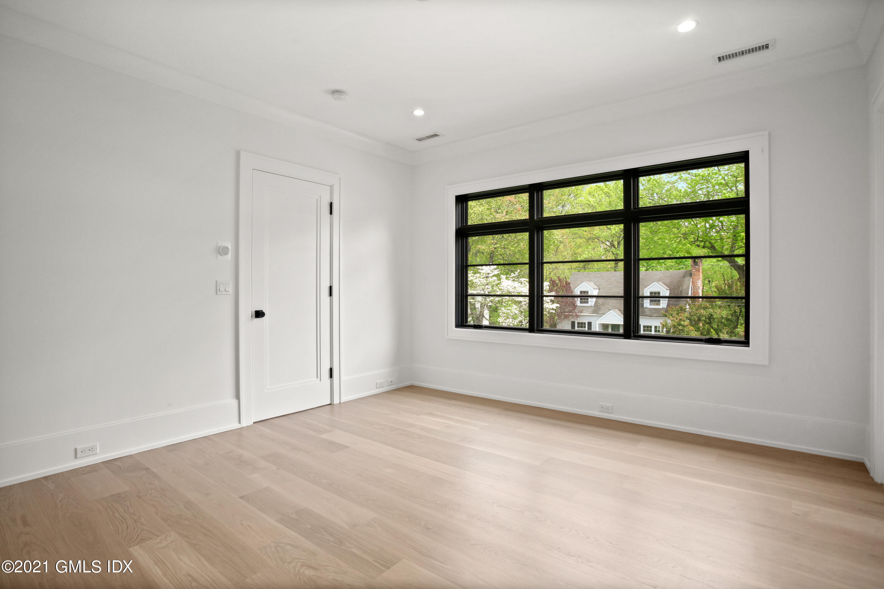 12 Dialstone Lane Riverside, CT 06878 - Photo 43 of 66 a view of an empty room with a window