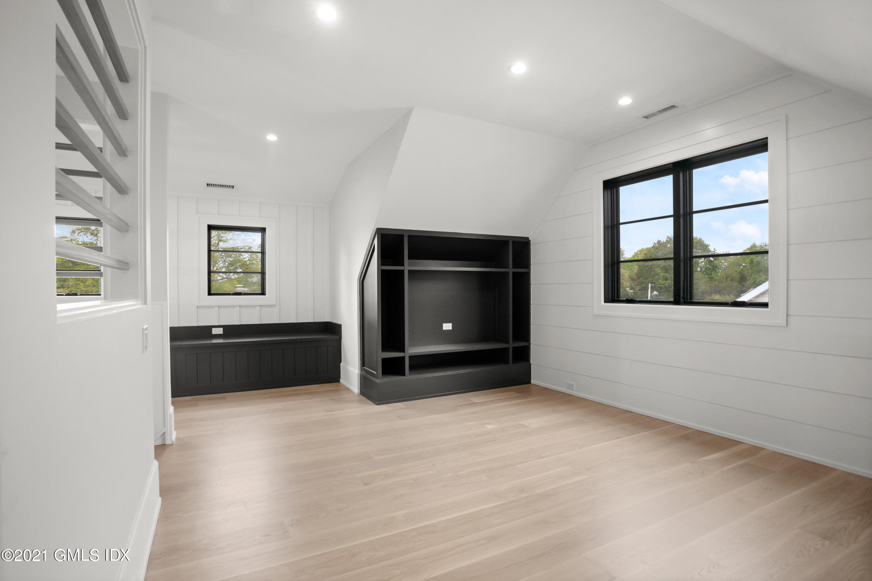 12 Dialstone Lane Riverside, CT 06878 - Photo 48 of 66 a living room with a large window