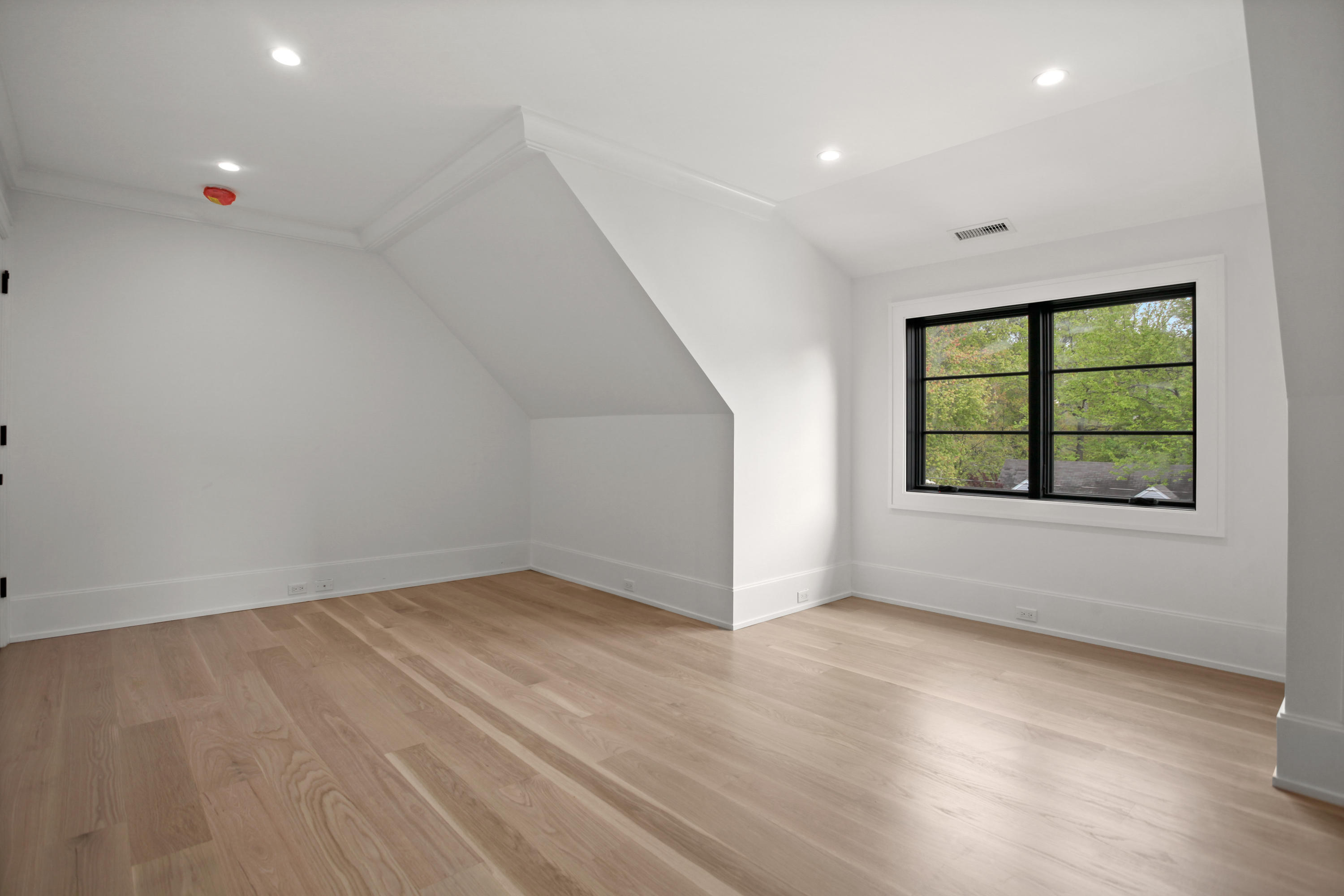 12 Dialstone Lane Riverside, CT 06878 - Photo 51 of 66 an empty room with wooden floor and windows
