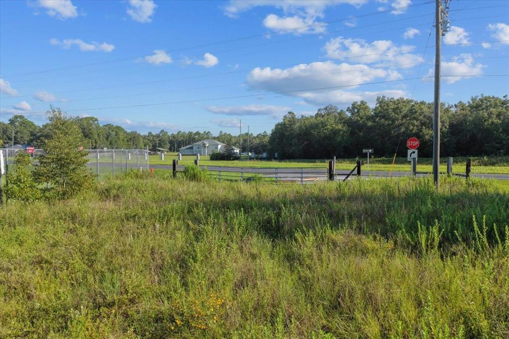 Ne Highway Bronson, FL 32621 - Photo 24 of 28 a view of outdoor space with green field and trees