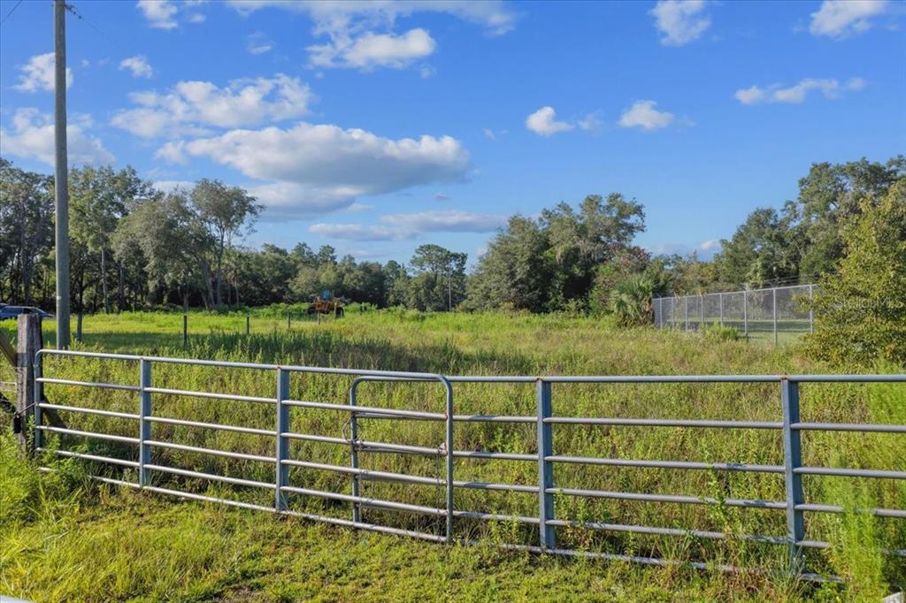 Ne Highway Bronson, FL 32621 - Photo 5 of 28 a view of a fence and a city view
