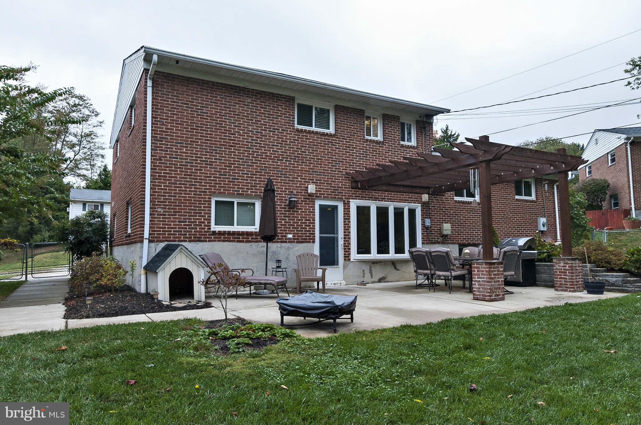 2003 Helmsby Road Baltimore, MD 21228 - Photo 26 of 26 a front view of a house with patio