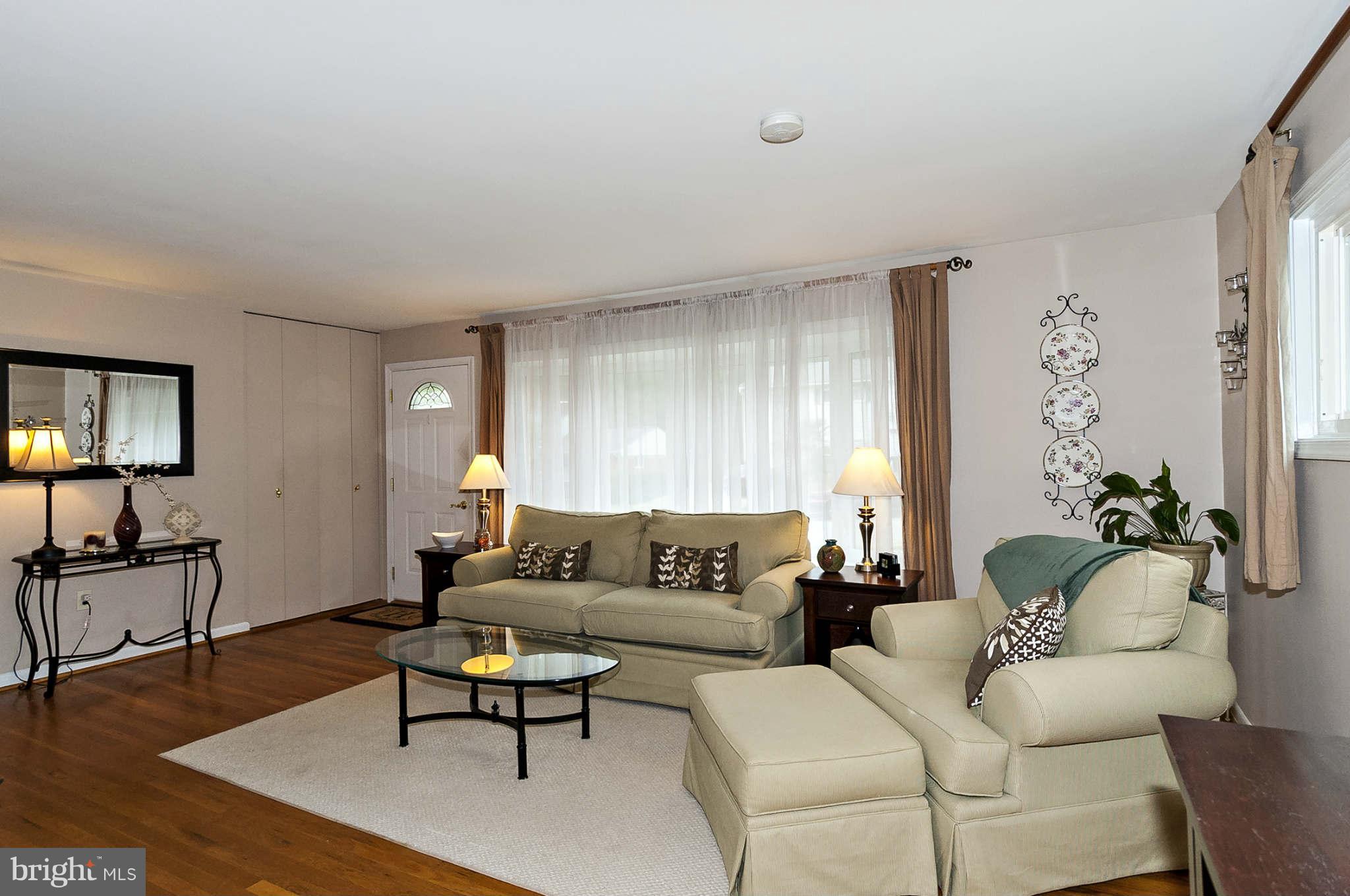 2003 Helmsby Road Baltimore, MD 21228 - Photo 4 of 26 a living room with furniture and a wooden floor