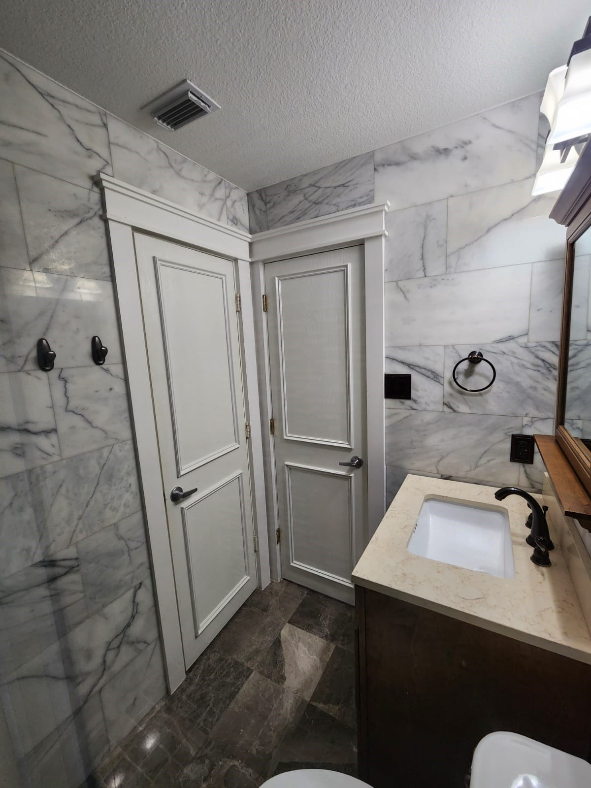 15506 Red Pine Ridge Way Houston, TX 77049 - Photo 27 of 49 a bathroom with a sink and a mirror