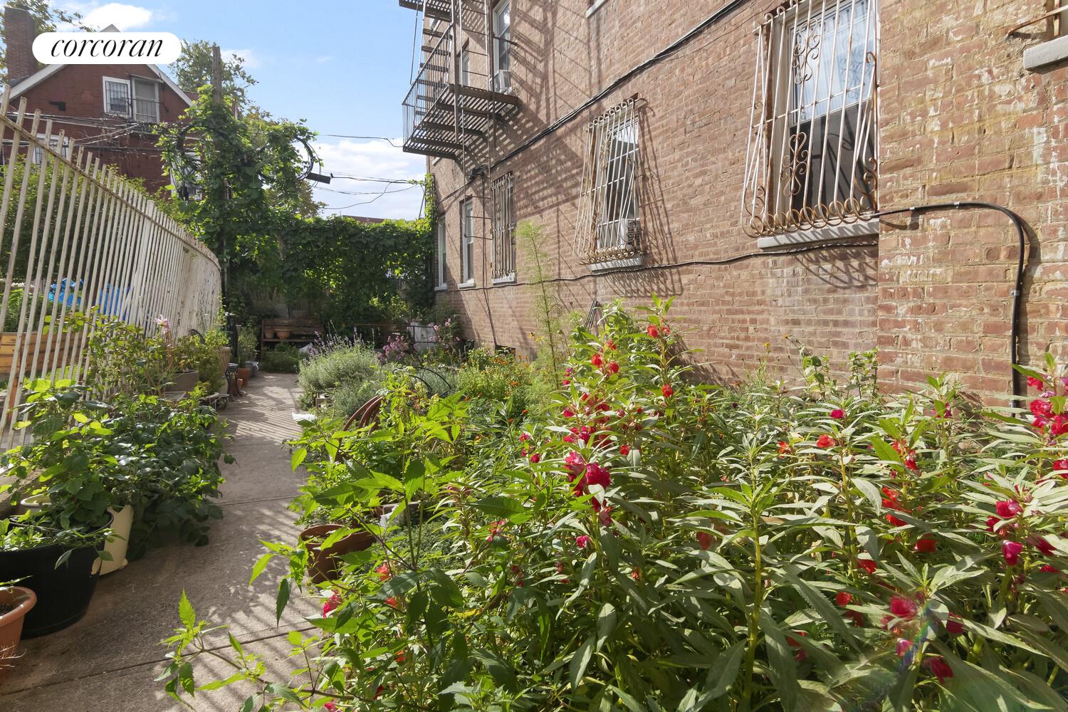 414 Albemarle Road, Unit 1D Brooklyn, NY 11218 - Photo 11 of 13 a backyard of a house with lots of green space