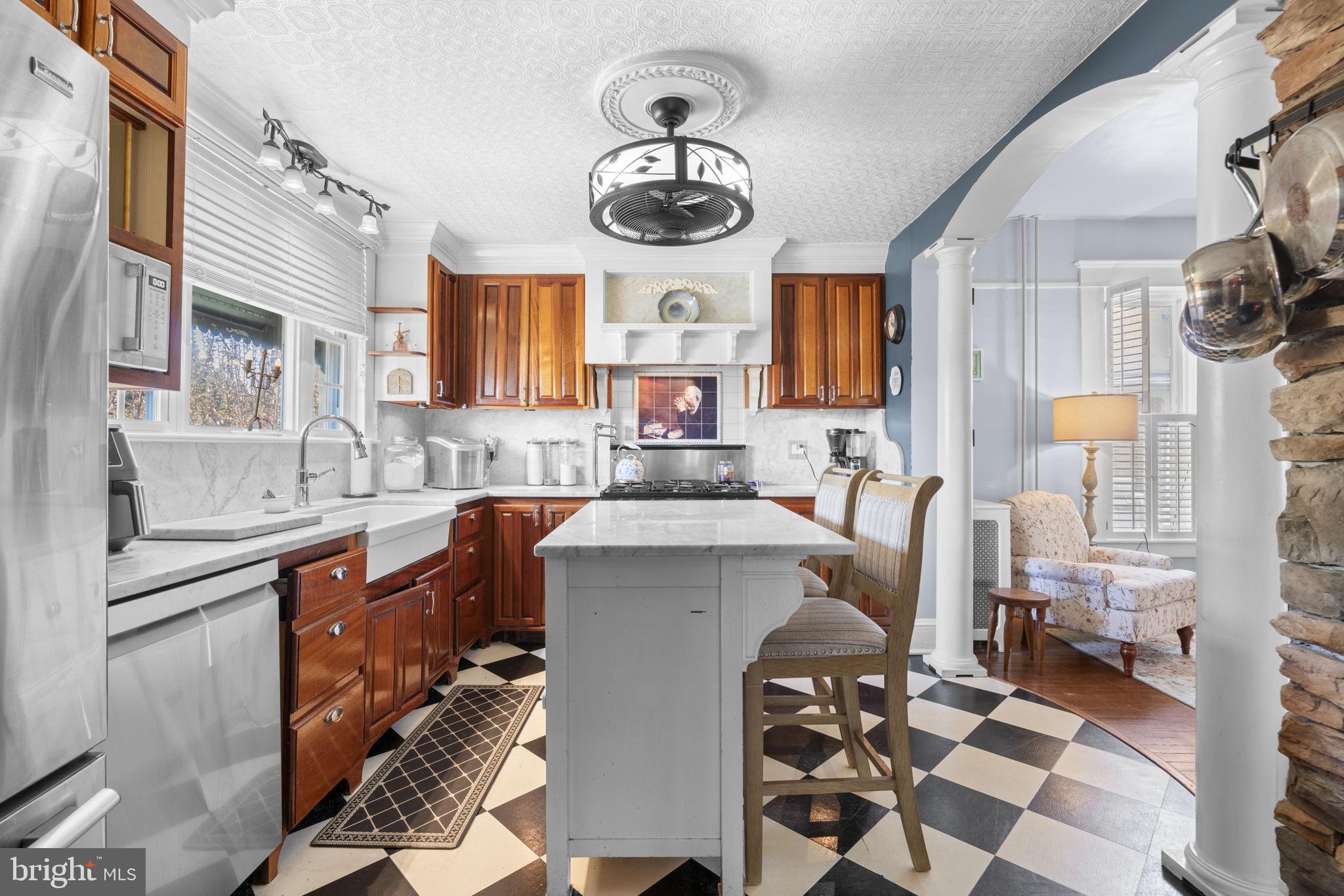 1916 Hanover Pike Hampstead, MD 21074 - Photo 20 of 46 a kitchen with stainless steel appliances granite countertop a sink and cabinets