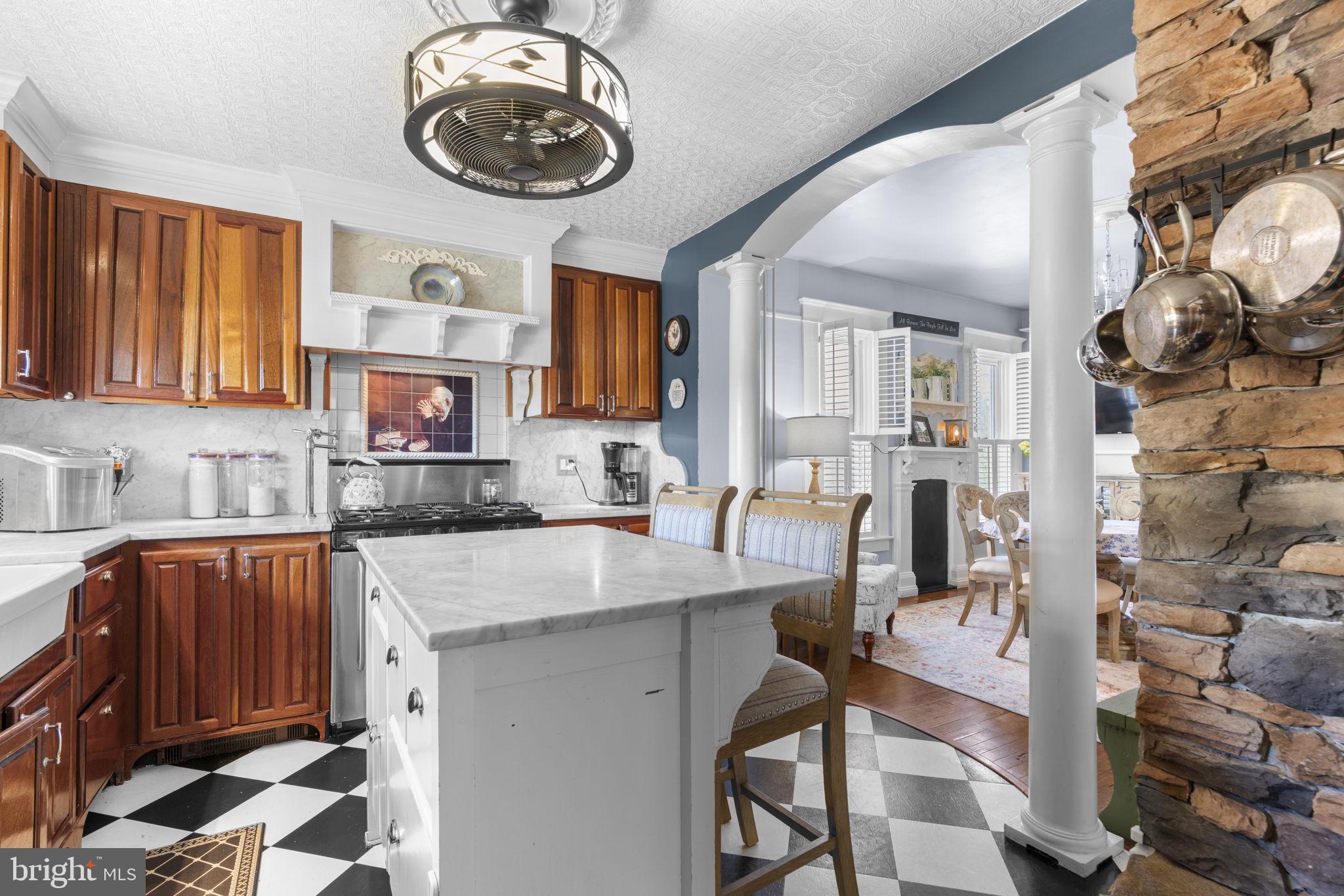 1916 Hanover Pike Hampstead, MD 21074 - Photo 21 of 46 a kitchen with a cabinets a sink and appliances