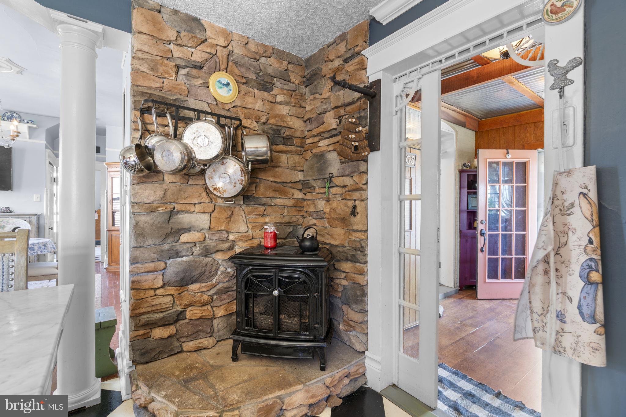 1916 Hanover Pike Hampstead, MD 21074 - Photo 22 of 46 a kitchen with a refrigerator and a stove