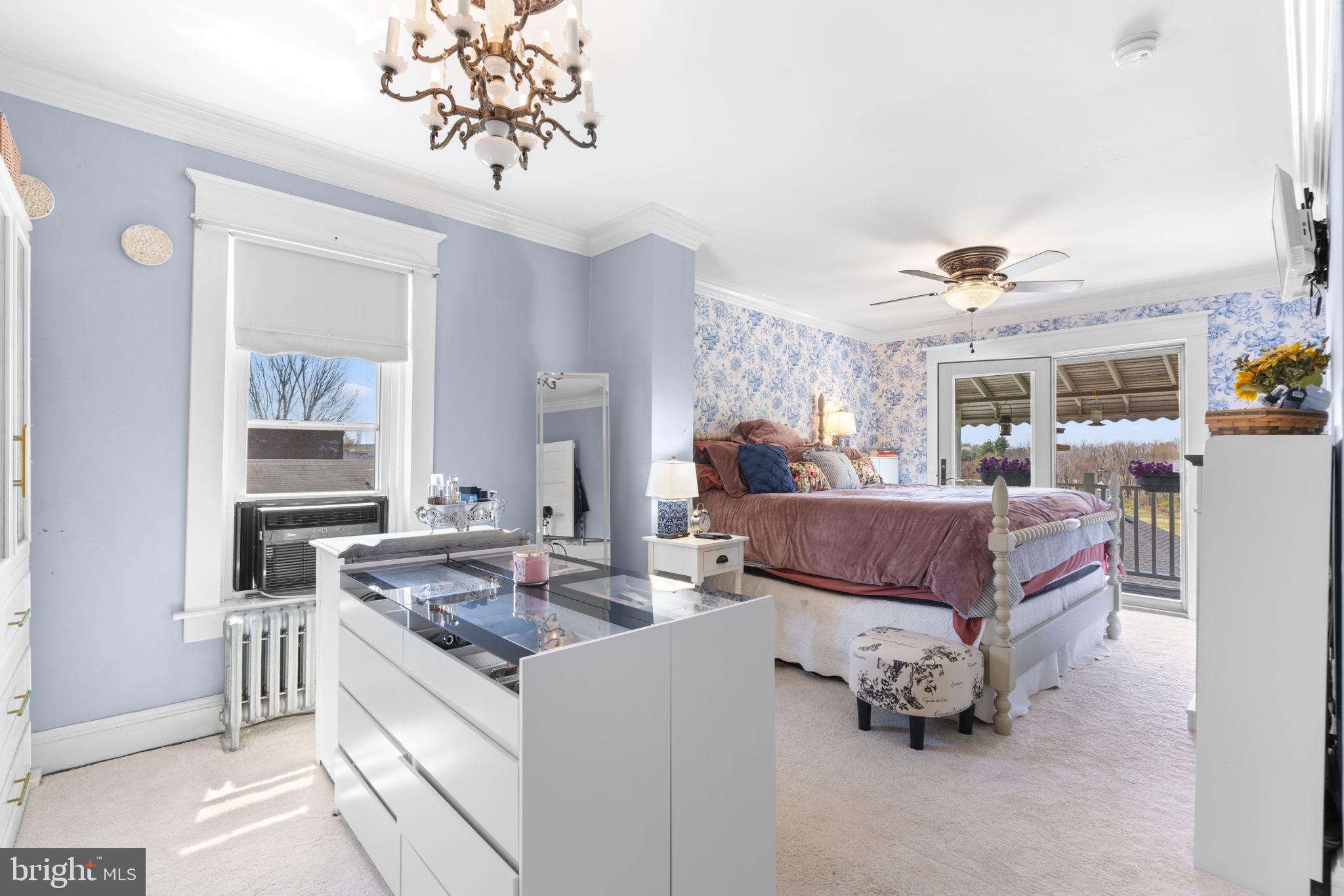 1916 Hanover Pike Hampstead, MD 21074 - Photo 25 of 46 a living room with furniture and a chandelier