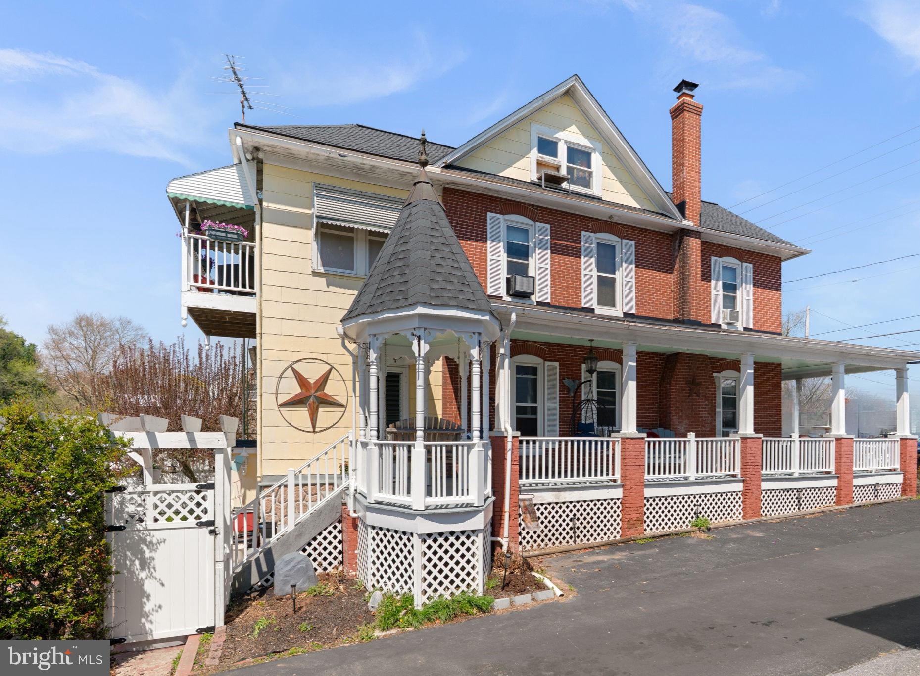 1916 Hanover Pike Hampstead, MD 21074 - Photo 3 of 46 a front view of a house with a porch