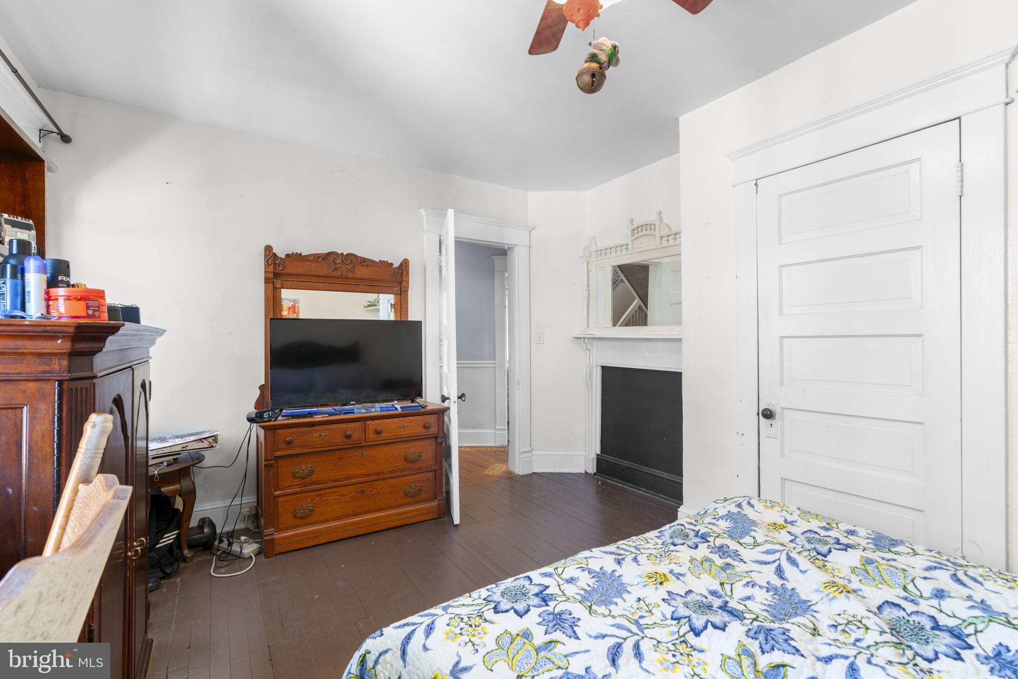 1916 Hanover Pike Hampstead, MD 21074 - Photo 32 of 46 a living room with furniture and a flat screen tv
