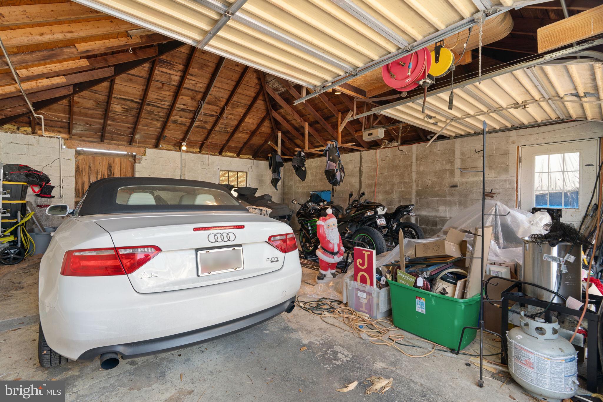 1916 Hanover Pike Hampstead, MD 21074 - Photo 43 of 46 a car parked in garage