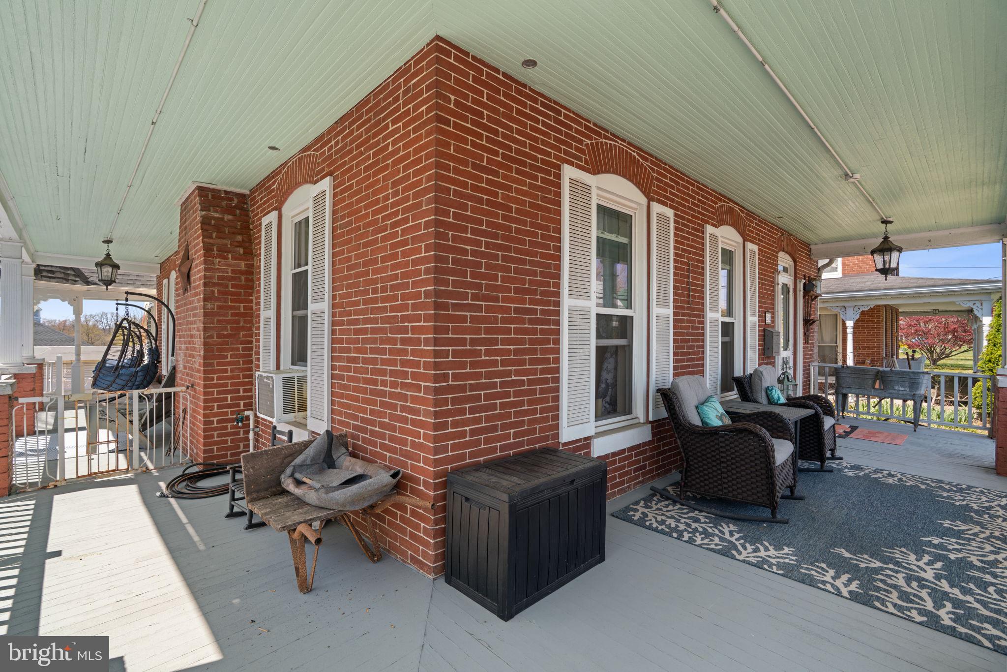 1916 Hanover Pike Hampstead, MD 21074 - Photo 5 of 46 a building outdoor space with patio furniture