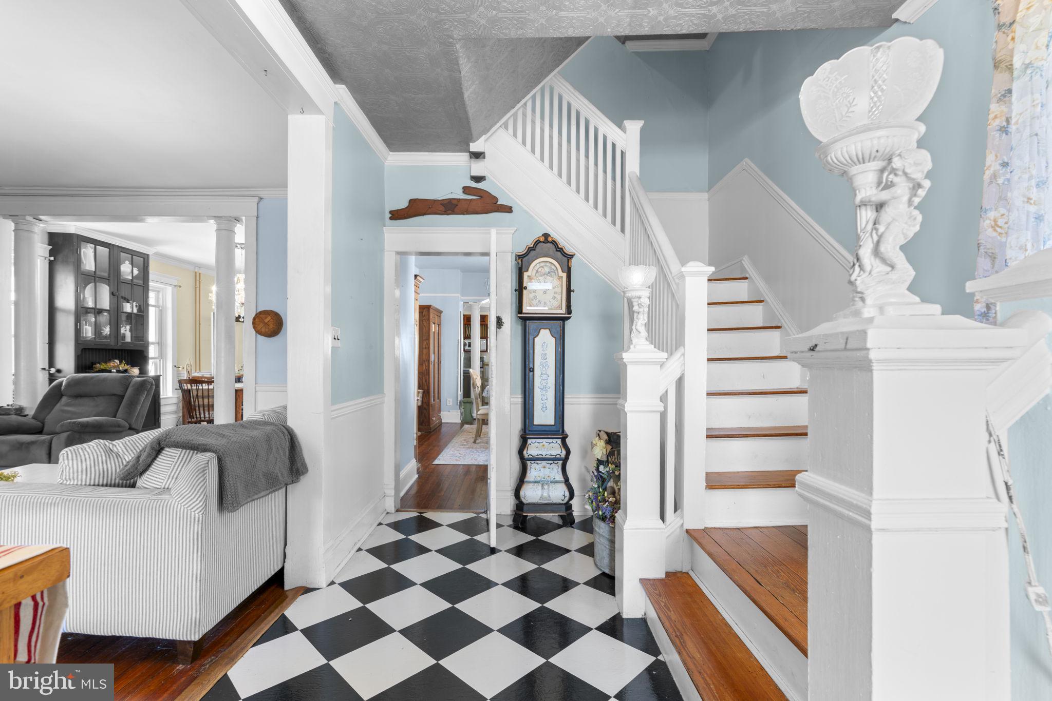 1916 Hanover Pike Hampstead, MD 21074 - Photo 7 of 46 a hall way with furniture and a fireplace