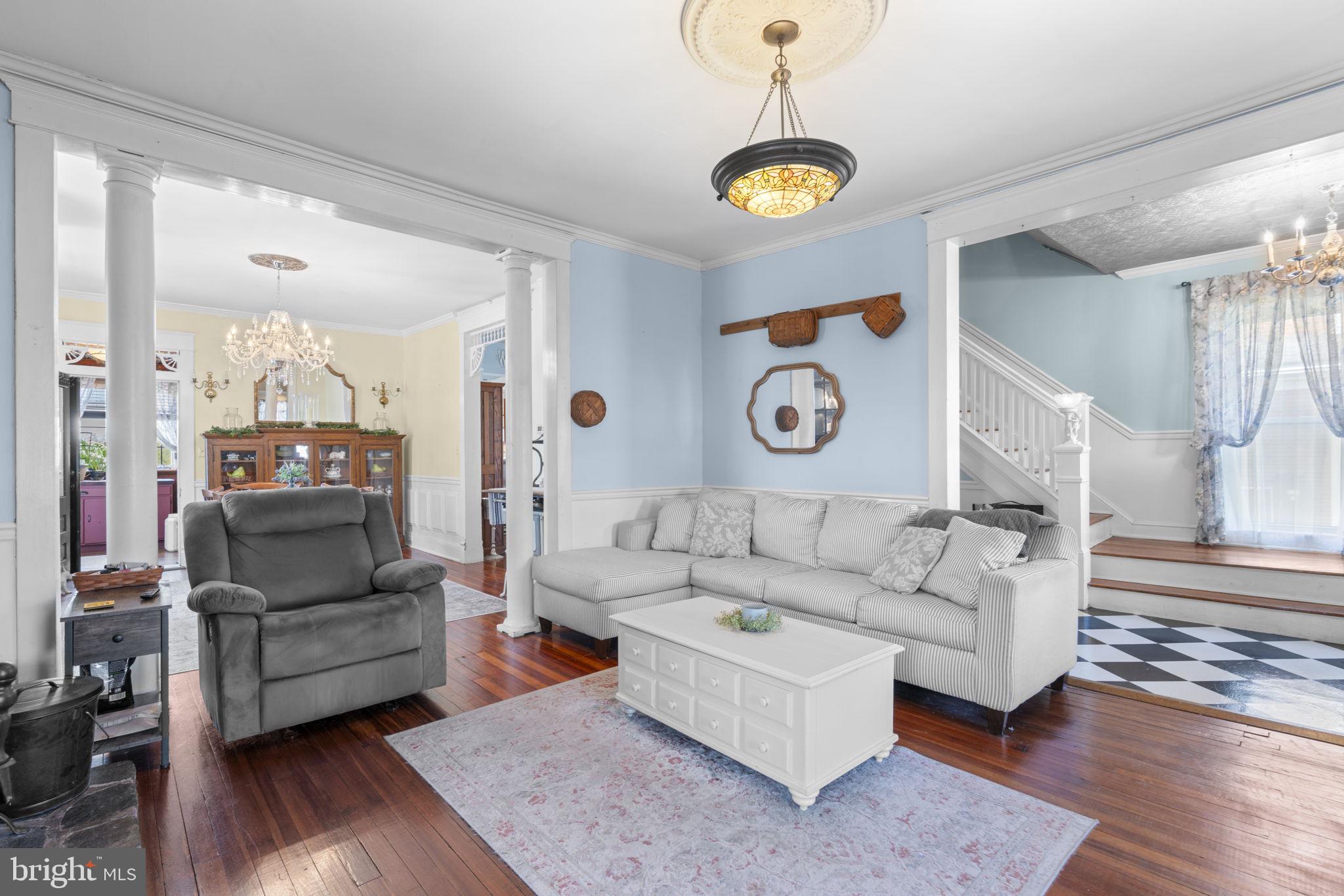 1916 Hanover Pike Hampstead, MD 21074 - Photo 9 of 46 a living room with furniture and a wooden floor
