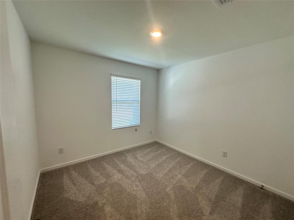 3800 Chambray Drive Sherman, TX 75092 - Photo 10 of 15 Carpeted spare room with baseboards