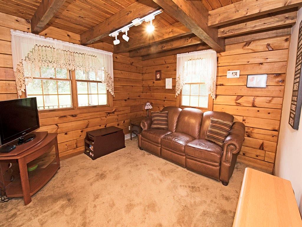 46 Henry Road Tarentum, PA 15084 - Photo 11 of 23 Room off Kitchen- Technically the Dining Room- being used as a Children's playroom- has hardwood under the carpet- so could be used for a multitude of purposes.