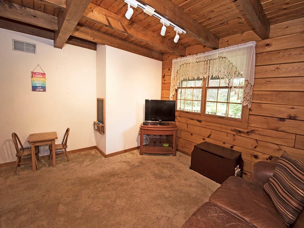 46 Henry Road Tarentum, PA 15084 - Photo 10 of 23 This Room off of the Kitchen is the Dining room, which is currently being used as the Children's playroom. And- there is Hardwood under the carpet.
