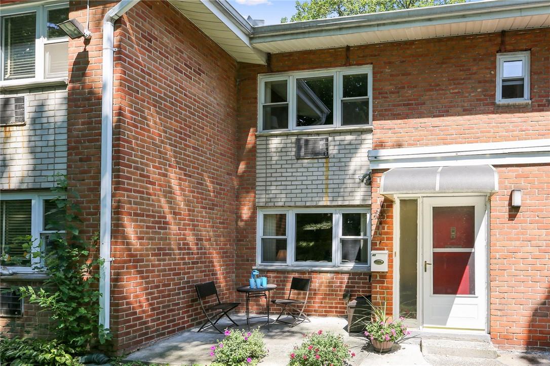 665 Pelham Road, Unit A5 New Rochelle, NY 10805 - Photo 1 of 1 South-facing Unit A5 and its own patio get a perfect balance of light and shade from beautiful mature trees throughout the day.
