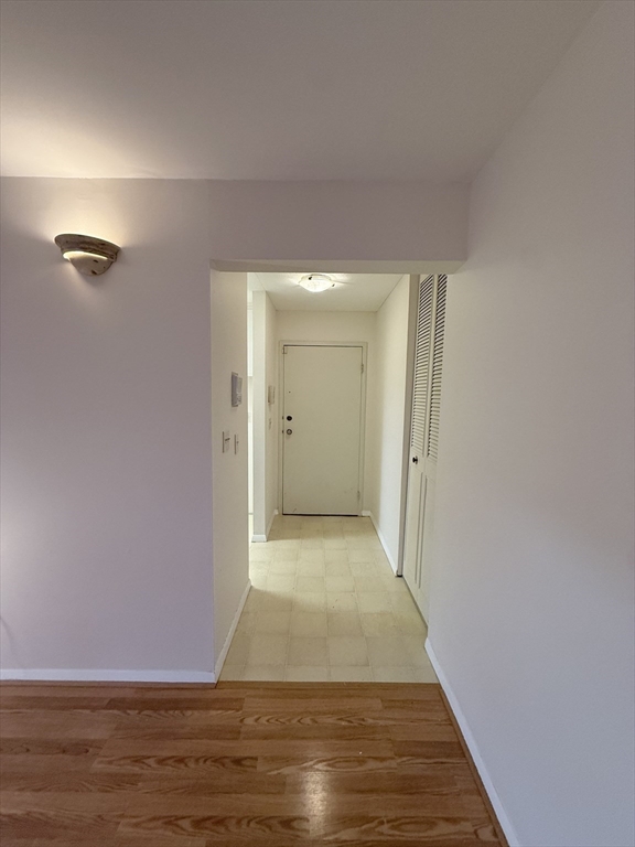 42 Shrewsbury Green Drive, Unit F Shrewsbury, MA 01545 - Photo 5 of 19 a view of a room with wooden floor