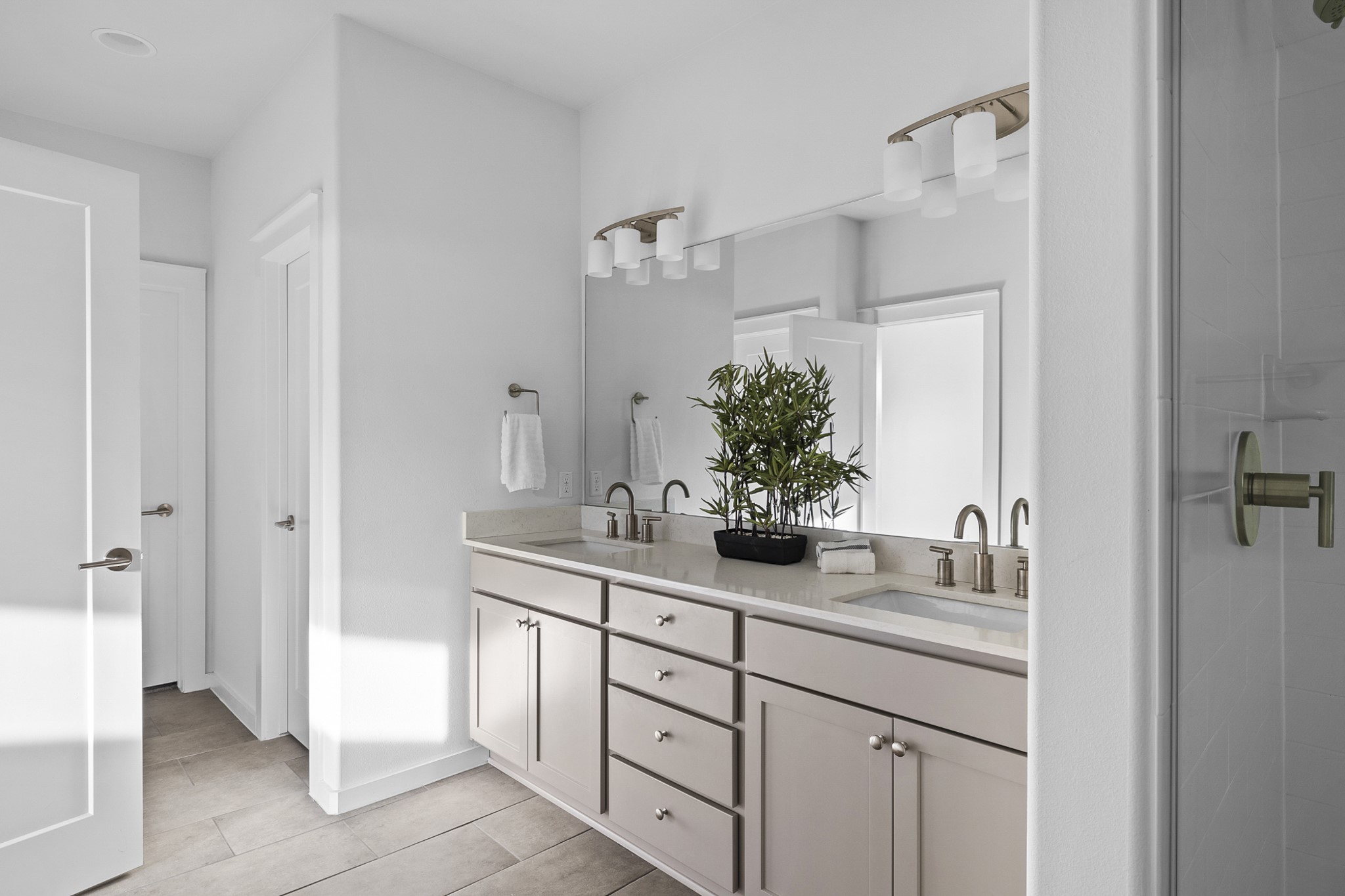 6800 Menchaca Road, Unit 22 Austin, TX 78745 - Photo 13 of 27 a bathroom with a sink and a mirror