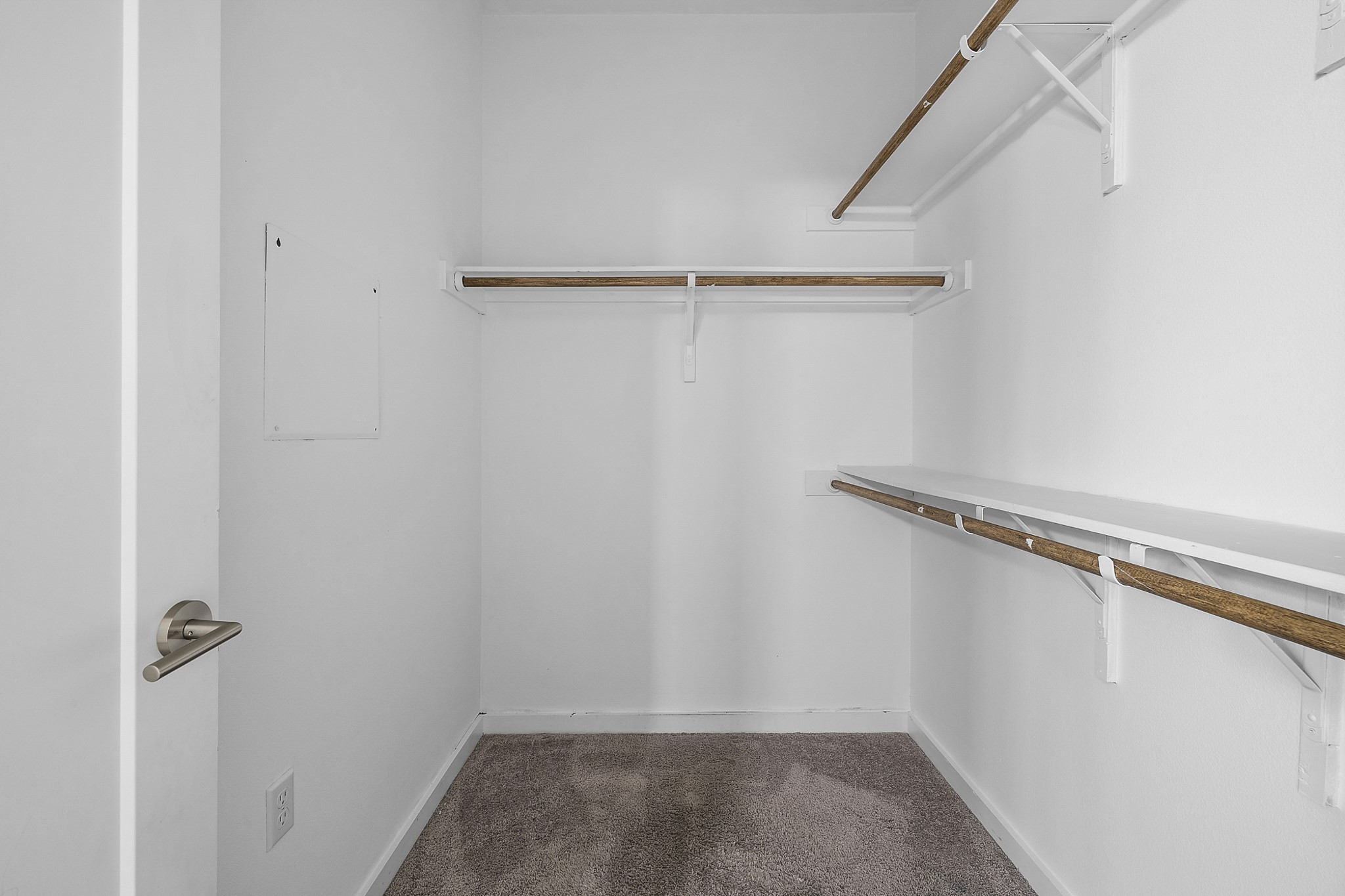 6800 Menchaca Road, Unit 22 Austin, TX 78745 - Photo 16 of 27 a view of a room with racks on the wall