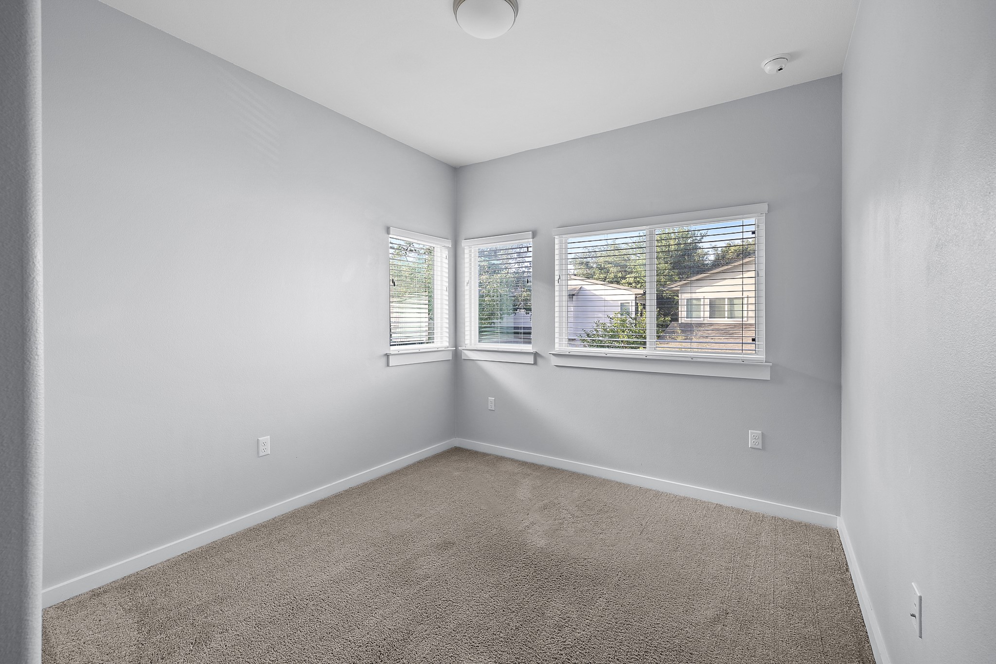 6800 Menchaca Road, Unit 22 Austin, TX 78745 - Photo 19 of 27 an empty room with windows