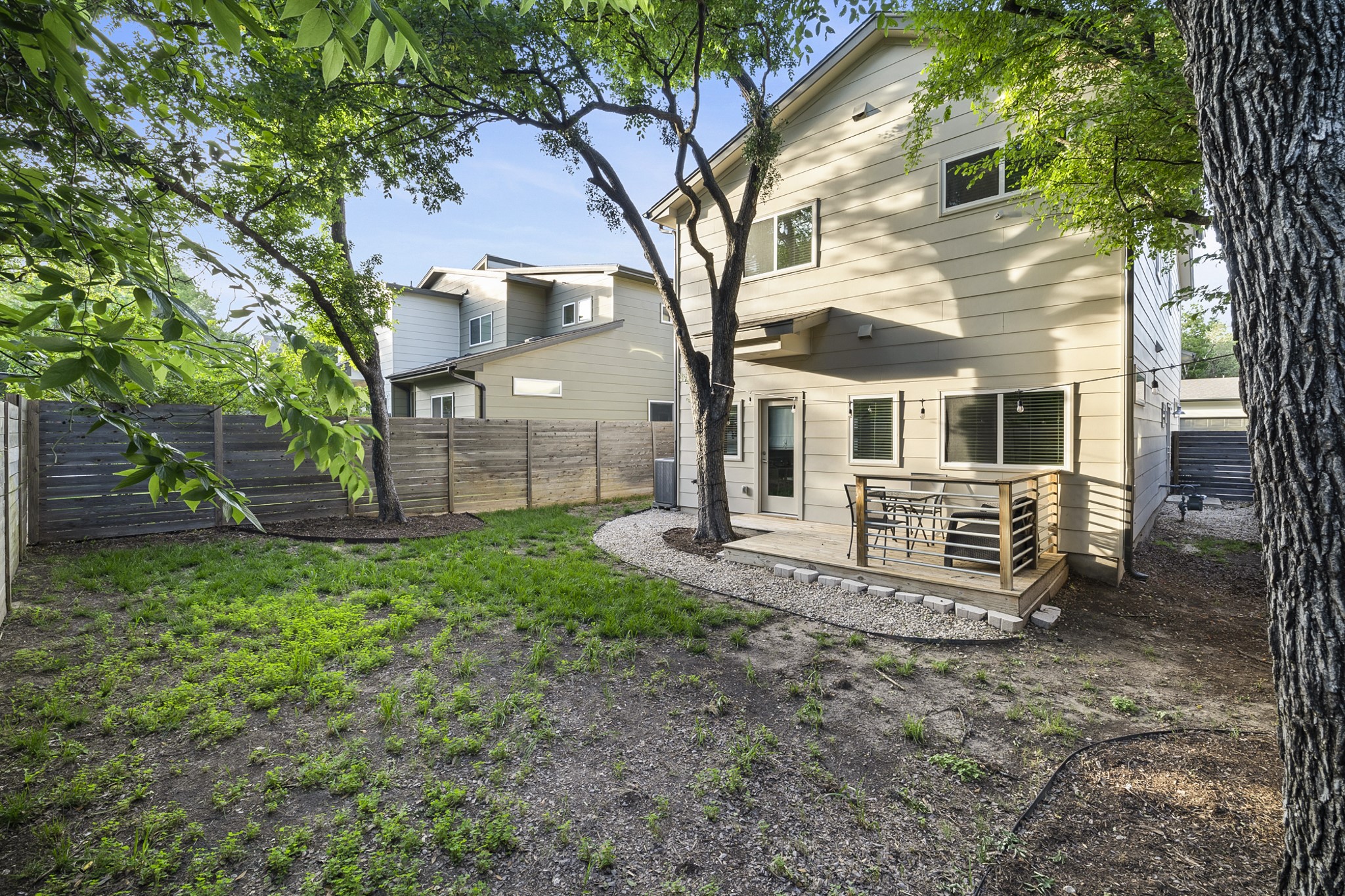 6800 Menchaca Road, Unit 22 Austin, TX 78745 - Photo 23 of 27 a view of a house with a yard