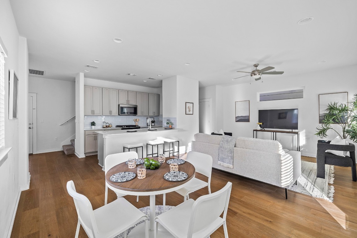 6800 Menchaca Road, Unit 22 Austin, TX 78745 - Photo 5 of 28 Dining area featuring stairs, recessed lighting, dark wood-style flooring, and ceiling fan