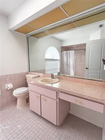 a bathroom with a sink and a toilet