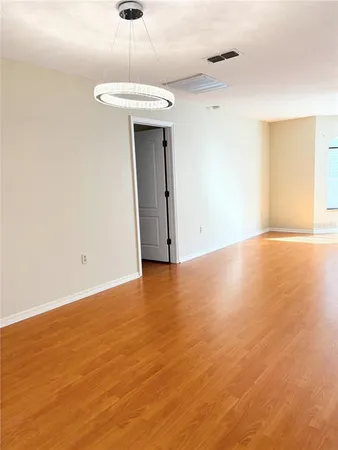 a view of a room with an empty space