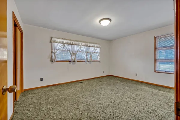 a bathroom with a sink and a yard