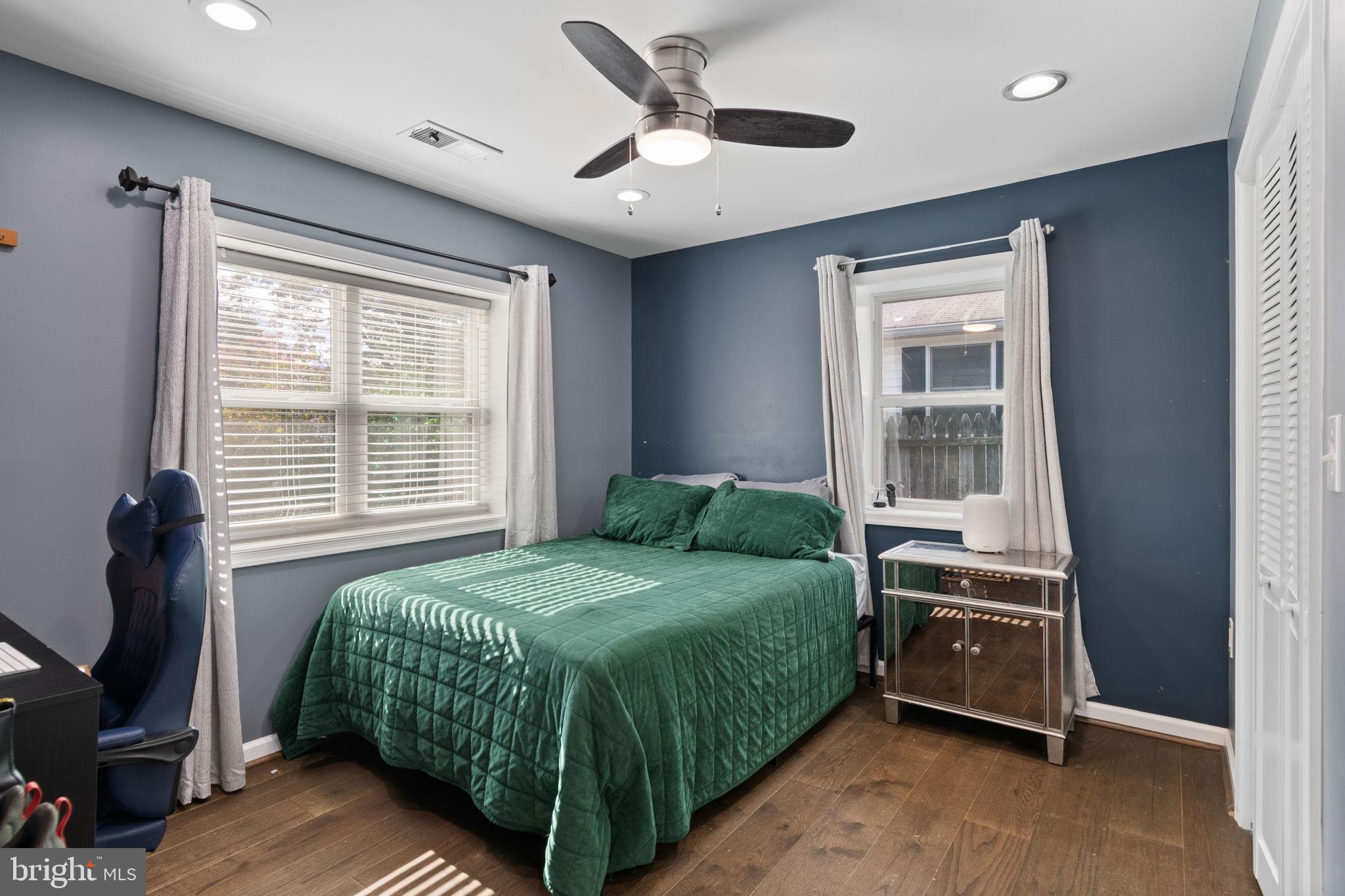 608 Blue Ridge Avenue Northeast Leesburg, VA 20176 - Photo 13 of 38 Serene bedroom with calming blue tones.