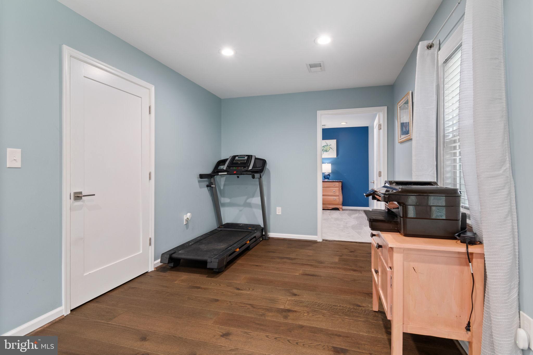 608 Blue Ridge Avenue Northeast Leesburg, VA 20176 - Photo 20 of 38 Bright and airy home gym space.
