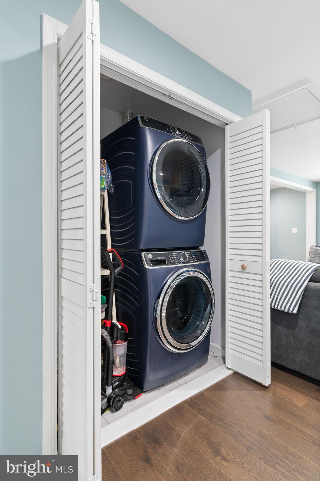 608 Blue Ridge Avenue Northeast Leesburg, VA 20176 - Photo 29 of 38 Sleek laundry setup in a stylish closet.