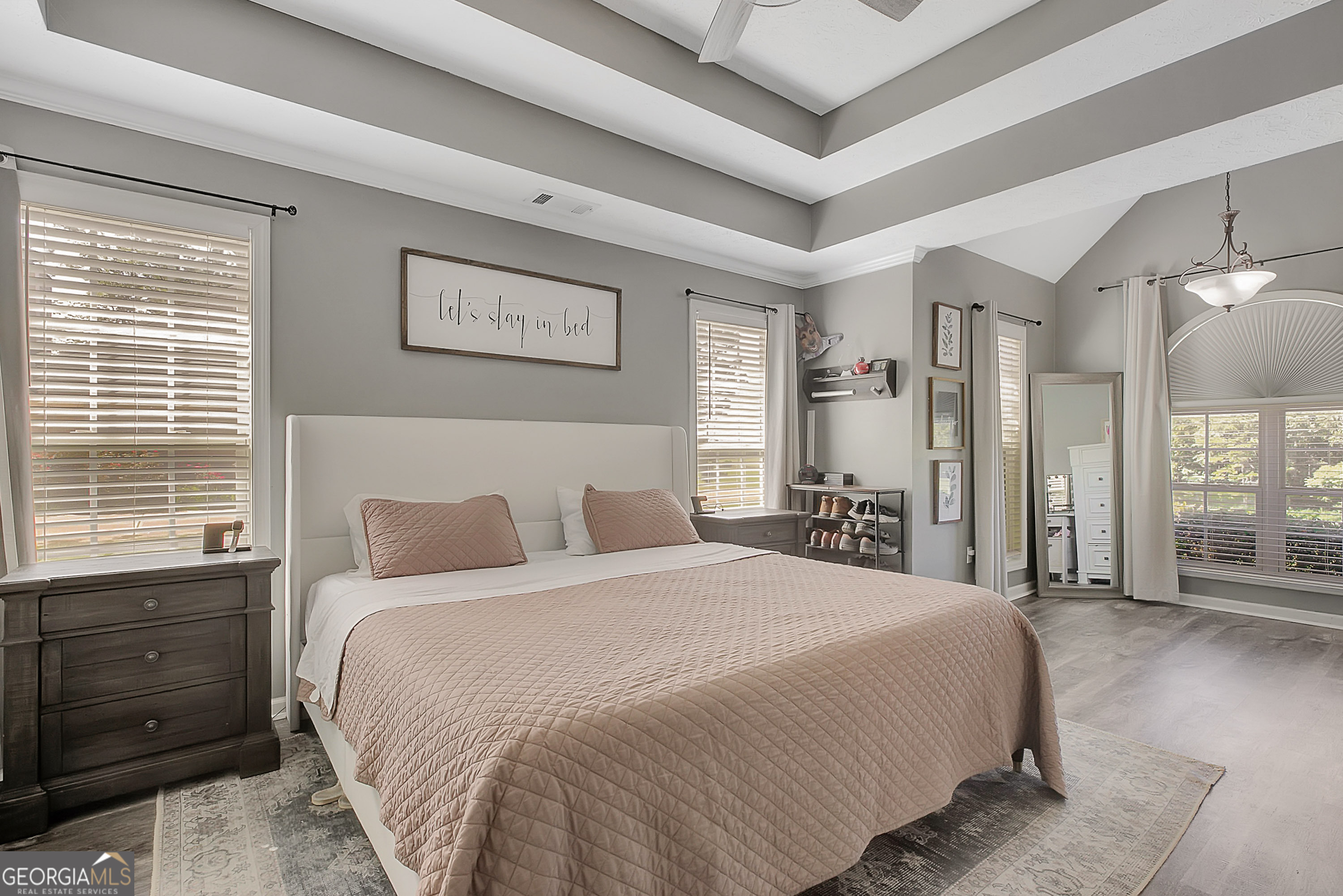 229 John Lovelace Road LaGrange, GA 30241 - Photo 13 of 59 a bedroom with a balcony a bed and a dresser