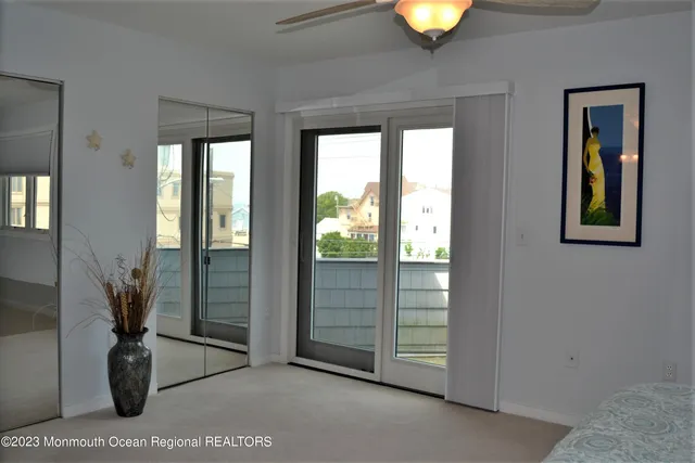 a room with a bed and a window