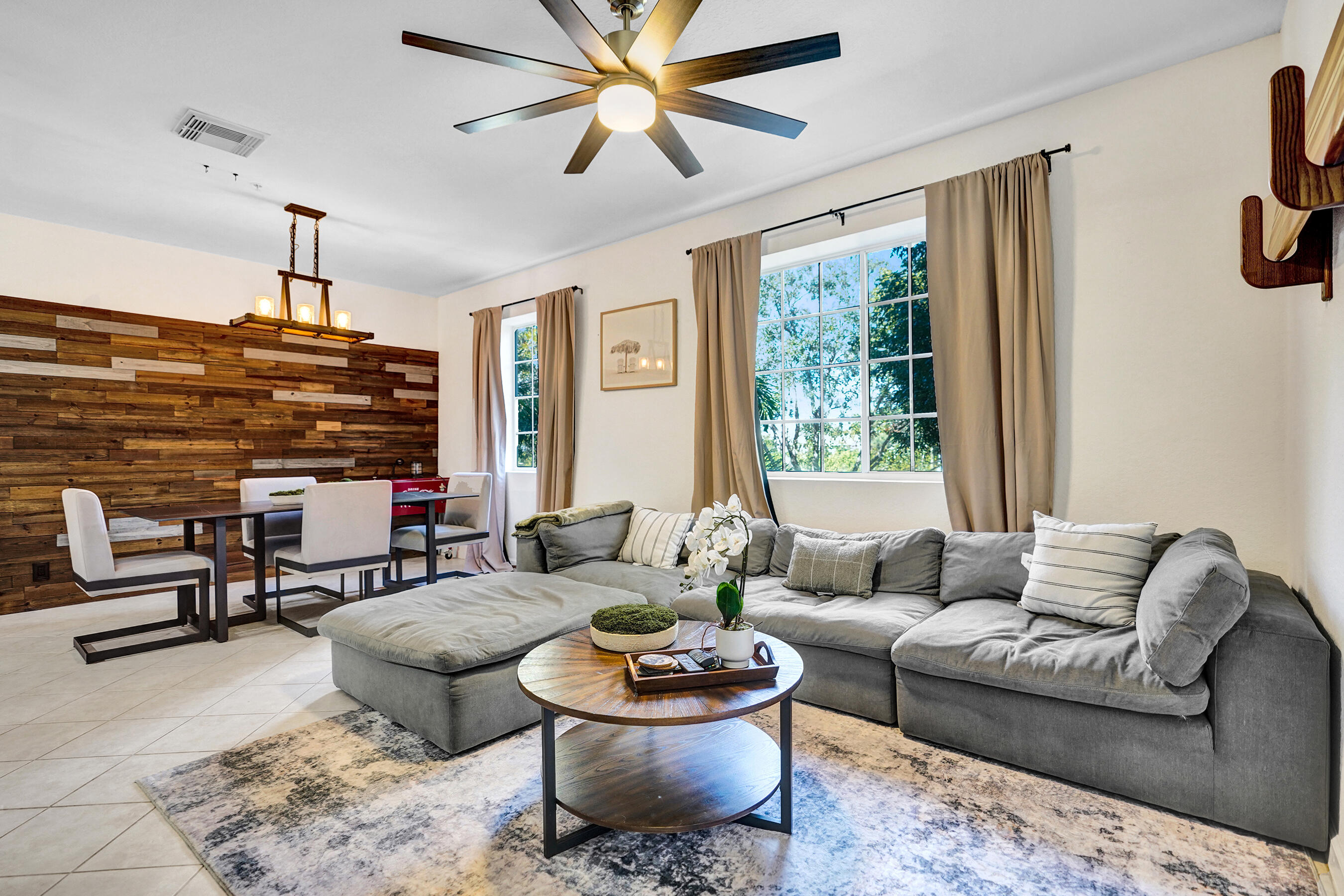 4533 Danson Way Delray Beach, FL 33445 - Photo 17 of 92 a living room with furniture and a large window