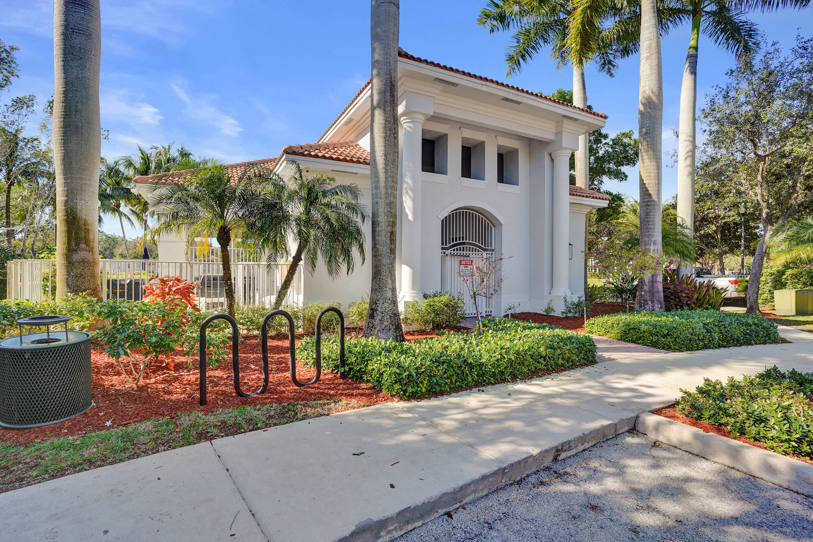 4533 Danson Way Delray Beach, FL 33445 - Photo 65 of 92 a front view of a house with a yard