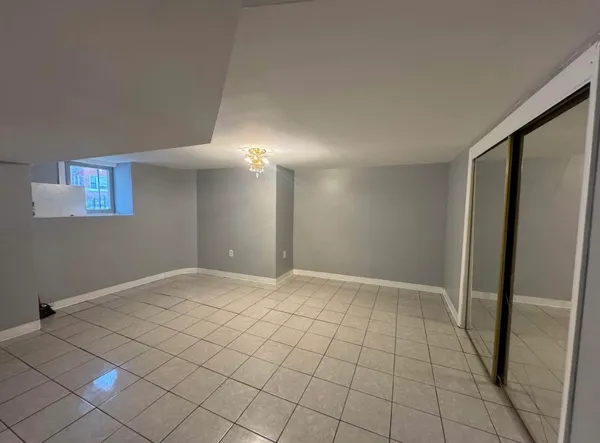 a view of empty room with a window