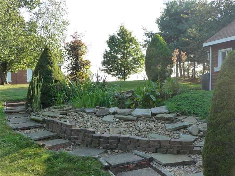 355 Zion Church Road Alverton, PA 15612 - Photo 18 of 25 Yard/Garden. Enjoy the Relaxing Koi Pond