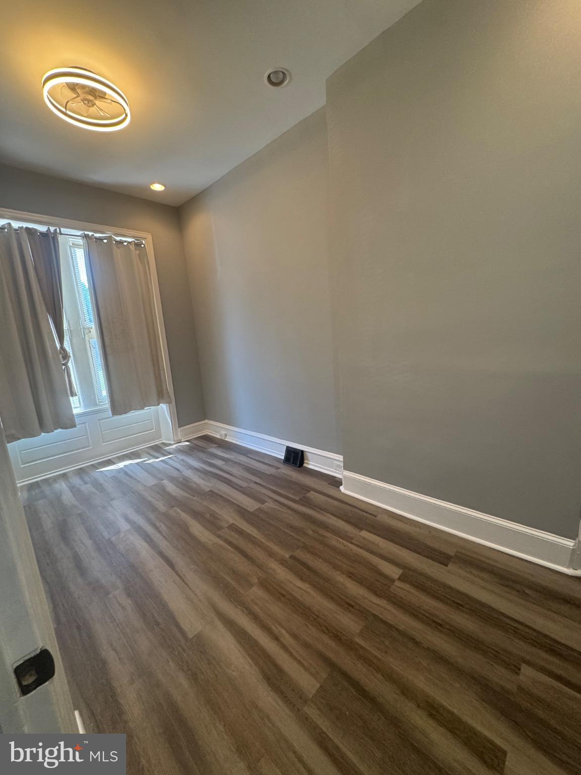 1717 North 26th Street, Unit 1 Philadelphia, PA 19121 - Photo 7 of 11 a view of a room with wooden floor